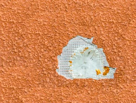 Destroyed polystyrene insulated wall Stock Photos