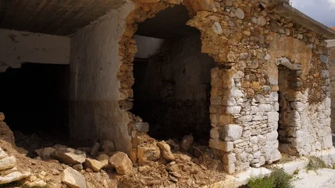 Destroyed poor house after bombing Stock Footage 101402763