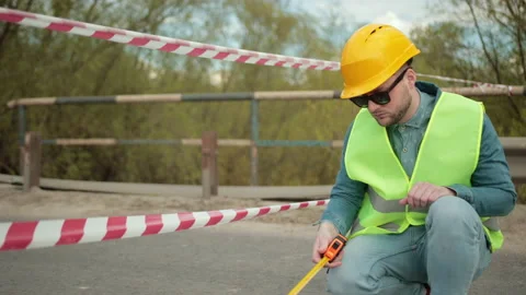 Destroyed road bridge collapse as consequences natural disaster. Repairing work Stock Footage 156697492