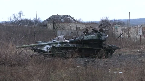 A destroyed Russian tank during the war in Ukraine near Izyum, Kharkiv region Stock Footage 239434286