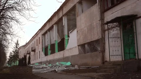 A destroyed school building after a Russian missile attack in Ukraine Stock Footage 266222122