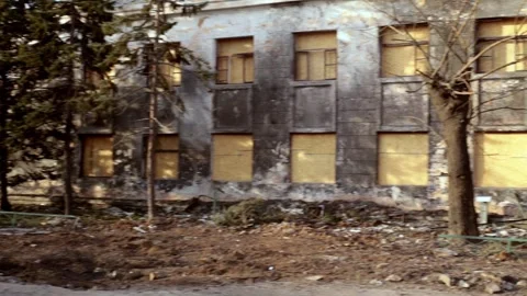 A destroyed school building after a Russian missile attack in Ukraine Stock Footage 266222174