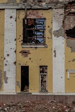 A destroyed school during hostilities at the beginning of the war Stock Photos