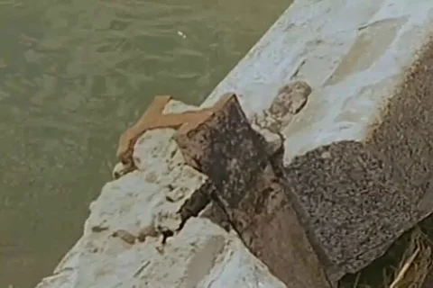 Destroyed section of retaining wall of bridge passes over Motoyasu River - 1946 Stock Footage 103372263