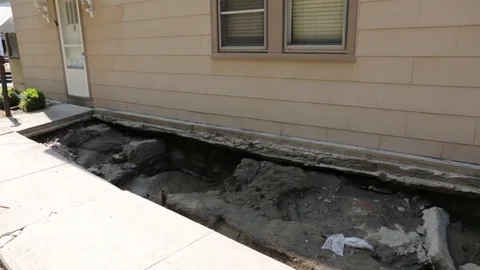 Destroyed sidewalk after flood damage and disaster in Ellicott City, Maryland. Stock Footage 70537750