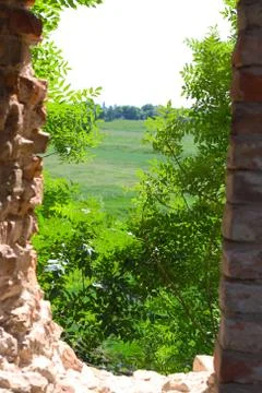 Destroyed window in castle Stock Photos