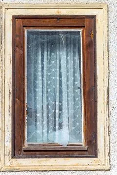 Destroyed window pane in a wood window A Destroyed window pane in a wood w... Stock Photos