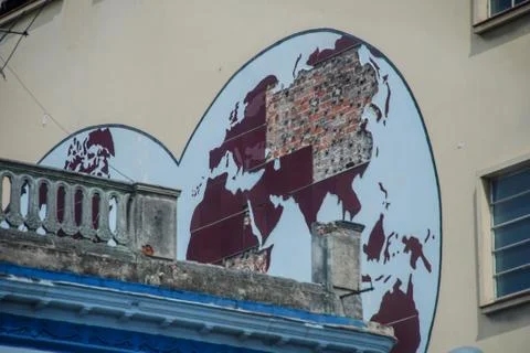 Destroyed world map on the wall of a house in Havana Stock Photos