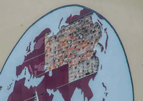 Destroyed world map on the wall of a house in Havana Stock Photos
