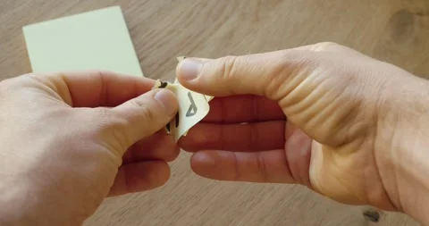 Destroying handwritten PIN note for security Stock Footage 335966830