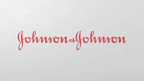 Destroying wall with painted logo of Johnson and Johnson. Crisis conceptual Stock Footage 105681665