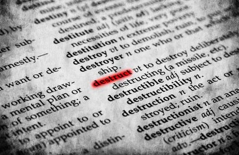 Destruct word in old textured dictionary Stock Photos