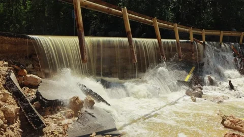 Destructed town road during the flood. Submerged and cracked asphalt landslid Stock Footage 165592005