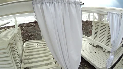 Destruction after a storm on the beach. There is debris, dirt lying around Stock Footage 169810018