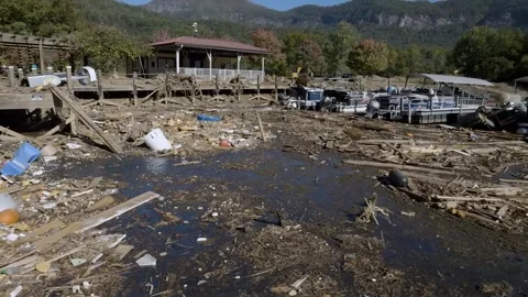 Destruction and debris left in the wake of Hurricane Helene Stock Footage 287996507