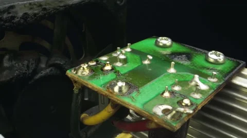 Destruction of computer motherboard by fire close up close-up Stockbeeldmateriaal 158313283