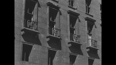 Destruction in Germany, work chips away Swastika Stock Footage 103379789