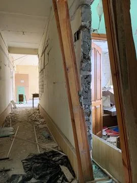 The destruction of the interior of the educational building after the rocke.. Stock Photos