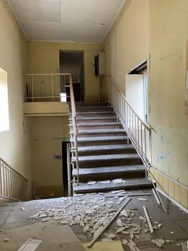 Destruction of the interior of the educational institution after a rocket a.. Stock Photos