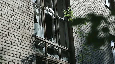 Destruction of or damage to public or private property. Broken glass in the Stock Footage 110439493