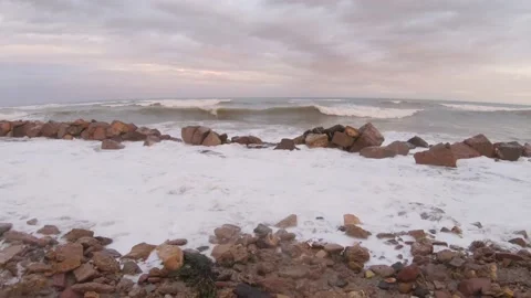 Destruction of stone breakwaters during storms Video stock 170068834