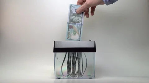 The destruction of the U.S. dollar with a schredor. Stock Footage 303475900