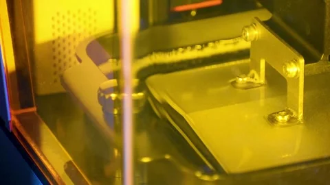 Detail of a 3d resin printer in operation Stock Footage 257585758