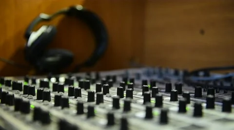 Detail with adjusting knobs on a professional audio mixer Stock Footage 67731438