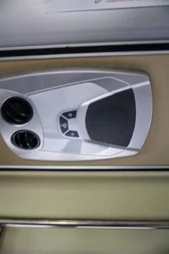 Detail of the air conditioning vent module and reading light on a passenger bus Fotos Stock