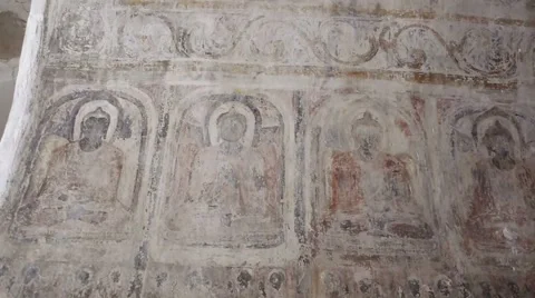 Detail of ancient ceiling and wall paintings in a Buddhist temple. Stock Footage 49046878