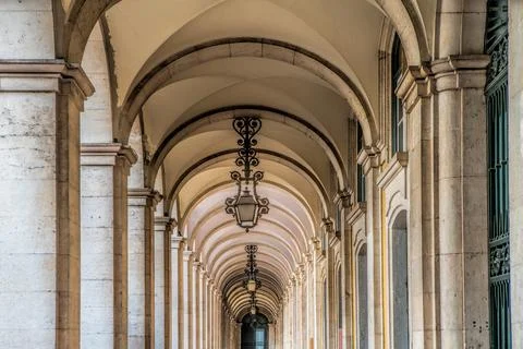 Detail of an arcade surrounding praca do comercio in Lisbon, Portugal. Stock Photos
