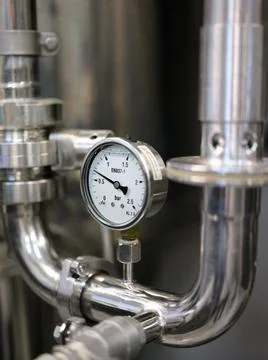 Detail of the barometer on a machine in a brewery. Stock Photos