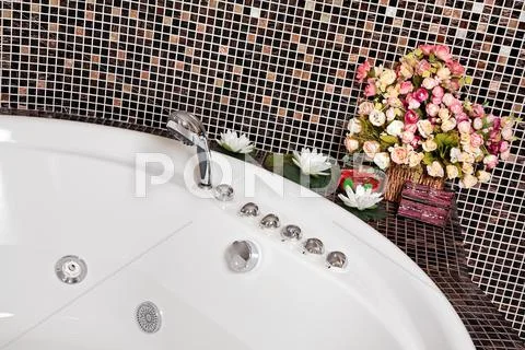 Detail of bathroom with mosaic and jacuzzi part Stock Photos