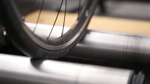 Detail of bicycle wheel on roller Stock Footage 50452845