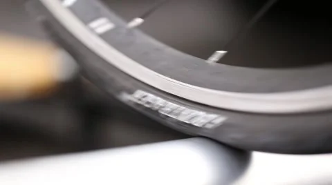 Detail of bicycle wheel on roller Stock Footage 50452865
