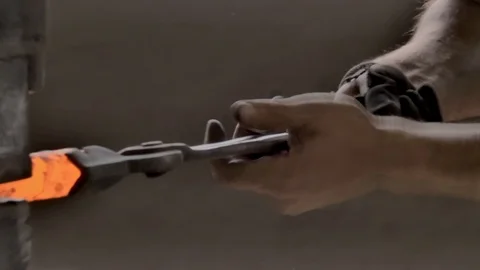 Detail of blacksmith at work Stock Footage 125947380