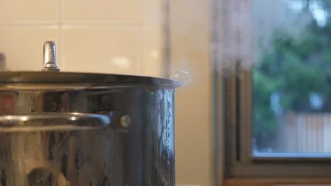 Pot full of boiling water stock footage. Video of cooking - 61664754
