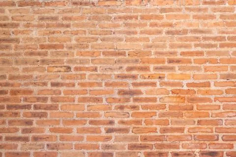 Detail of a brown brick wall texture and background with copy space Stock Photos