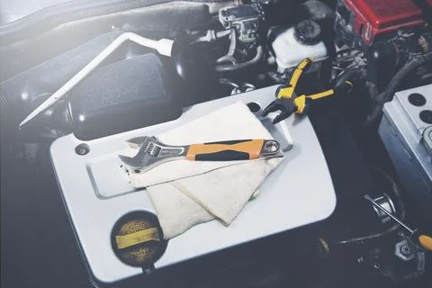 Detail of  car engine with tools Stock Photos