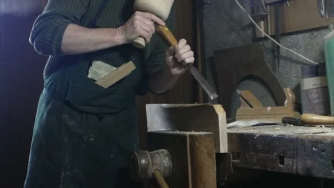 Detail, carpenter uses a carpenter's chisel Stock Footage 88817924