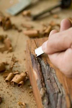 Detail of a carpenter using a chisel Stock Photos