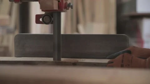 Detail of a carpenter using an electric wood saw. Wood cutting machine. Stock Footage 168544971