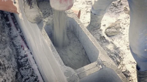 Detail of casting pump concrete to foundations. Workers work on site. Видео 87475881