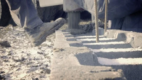 Detail of casting pump concrete to foundations. Workers work on site. Видео 87475979