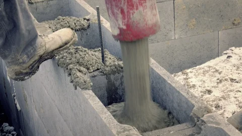 Detail of casting pump concrete to foundations. Workers work on site. Vídeo Stock 88986589