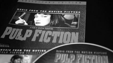 Detail of CD and artwork of OST of the film PULP FICTION. Second film by di.. Stock Footage 251667902
