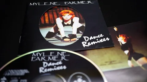 Detail of CD and artwork of special edition of a double CD of MYLENE FARMER Stock Footage 107443353