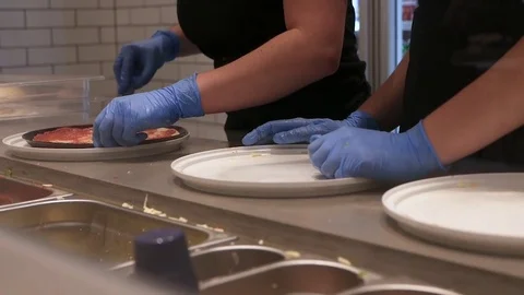 Detail of Chefs in process of preparing a pizza Stock Footage 83324147