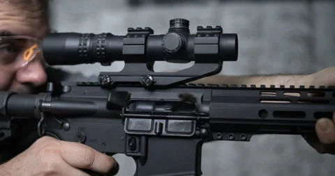 Detail Close-Up of Finger Pulling Trigger on Assault Rifle, Multipel shots .. Stock-Footage 252541037