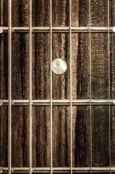 Detail close-up view of guitar strings and frets Foto stock